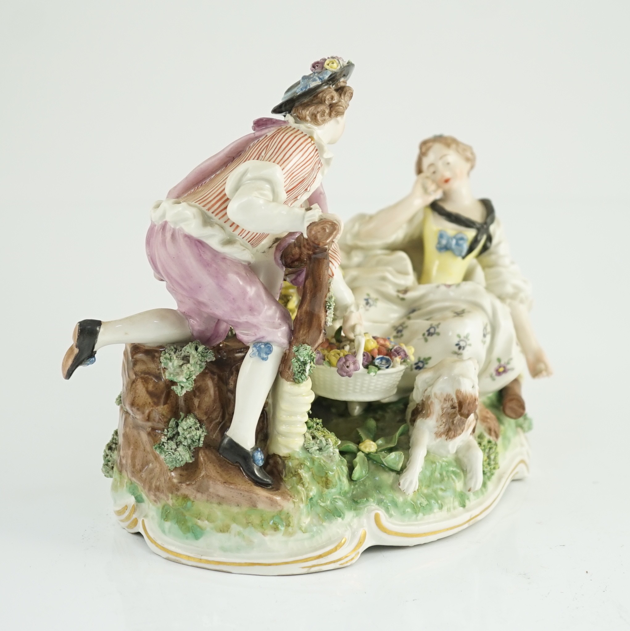 A Frankenthal porcelain bucolic group of two lovers, c.1777, 18cm high, 20.5cm wide, small typical losses, Provenance - purchased from Winifred Williams, Eastbourne/London before 1970.